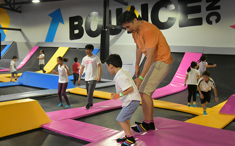 Wellington College Bangkok studence at Bounce on trampolines