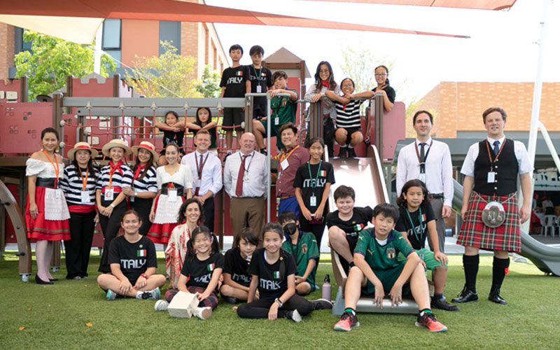 Wellington College Bangkok International day group photo of students and staff dressed up